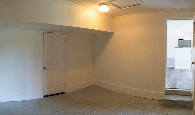 Bonus room. Door on the right leads to the living room. - 417 Polaris Pl