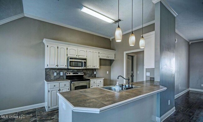 Foto del edificio - 121 Millhouse Drive