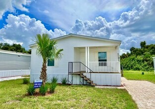 Building Photo - 6710 Hidden Oaks Dr