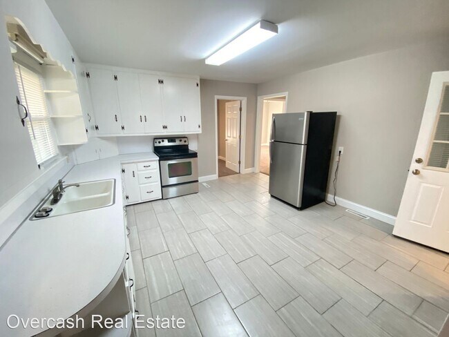 Building Photo - 2 br, 1 bath House - 534 W 8th St