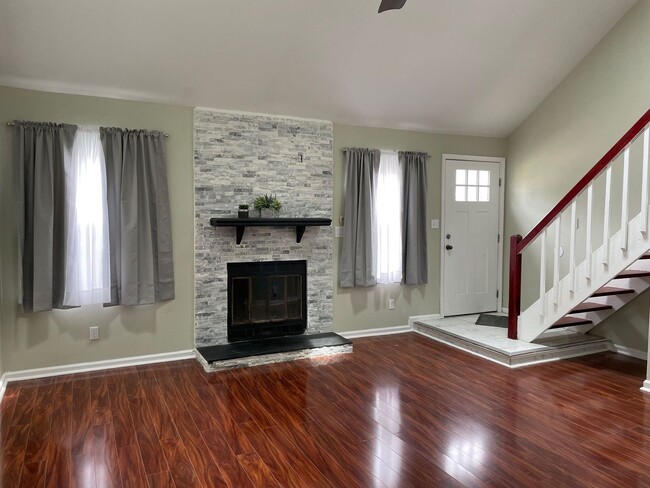 Building Photo - Welcome to our charming Townhome in the he...