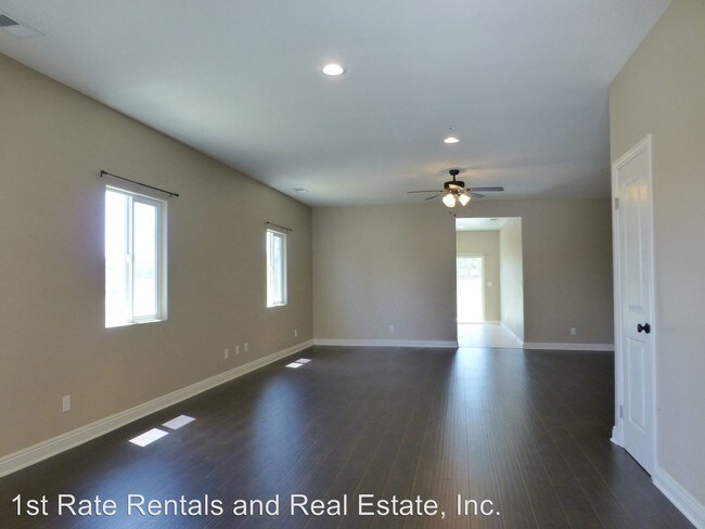 Building Photo - 4 br, 2 bath House - 4948 Hollyhock Ln