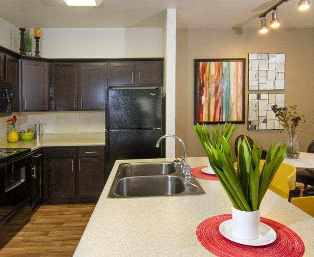 Granite Countertop Kitchen Island - Talavera at the Junction Apartments & Townhomes