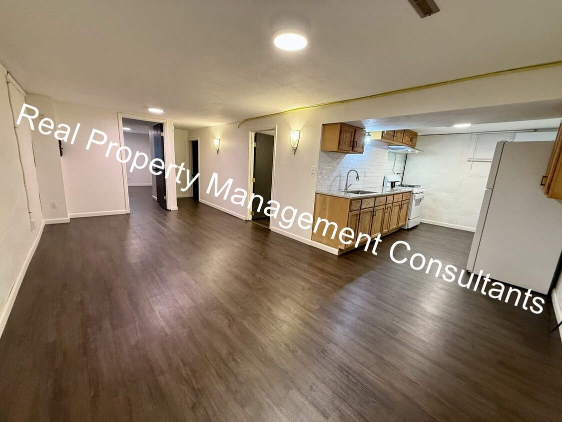 Primary Photo - Cozy 2-Bedroom Lower-Level Home – All Util...