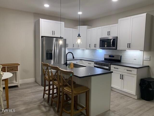 Building Photo - 705 N Main Ave