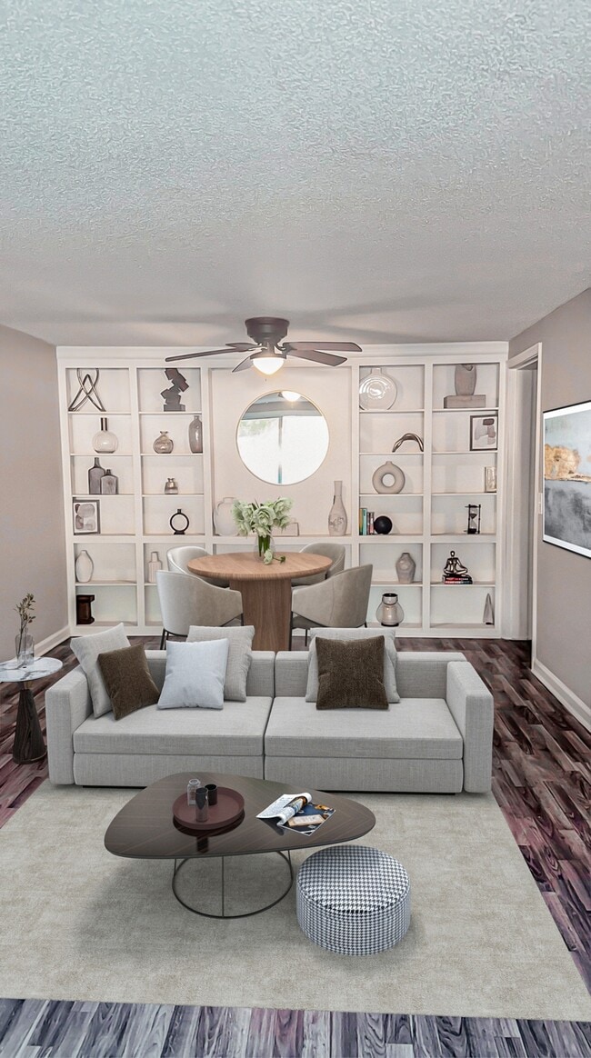 Step into spacious living rooms designed with large windows and versatile color palettes, ready to complement your personal style. - Camberwell Apartments
