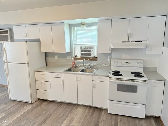 Foto del edificio - 6259 E 11th St