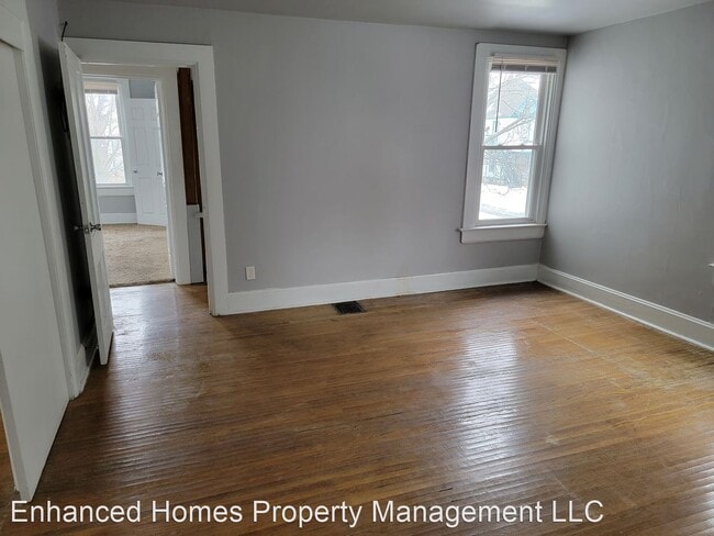 Building Photo - 4 br, 3 bath House - 612 W. 14th St.