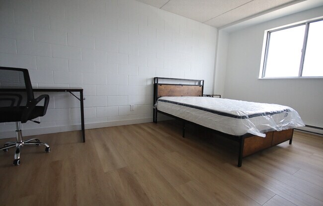 Photo du bâtiment - All Inclusive Student Rentals