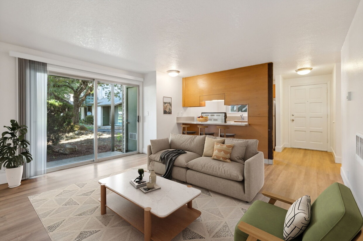 Downstairs 699sqft Living Room - Sawyer Pointe