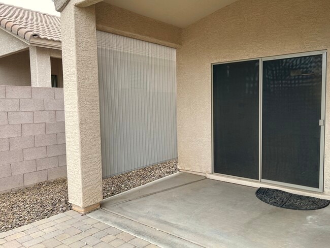 Rollable patio shade - 18301 N 90th Ave