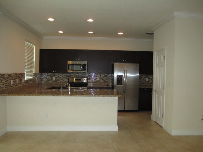 Building Photo - 1501 NW Cataluna Cir