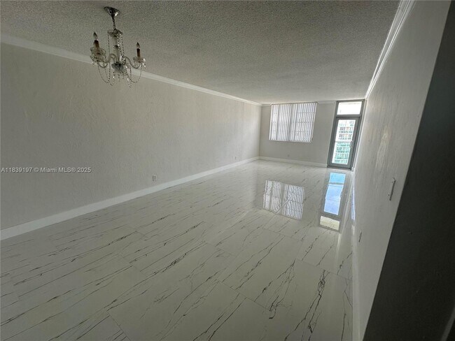 Building Photo - 19390 Collins Ave
