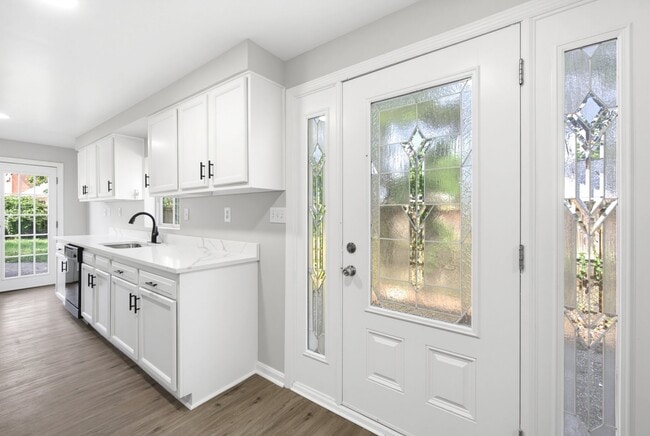 Building Photo - 8129 Woodholme Cir
