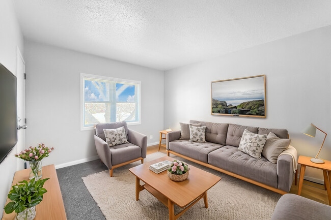 Living Room - Wakonda Village and Manor Apartment Homes