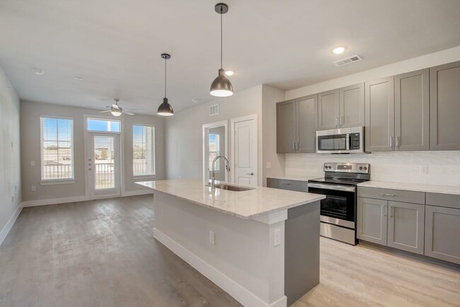 Building Photo - Live the Austin Vibe: Trendy 2BR in the He...