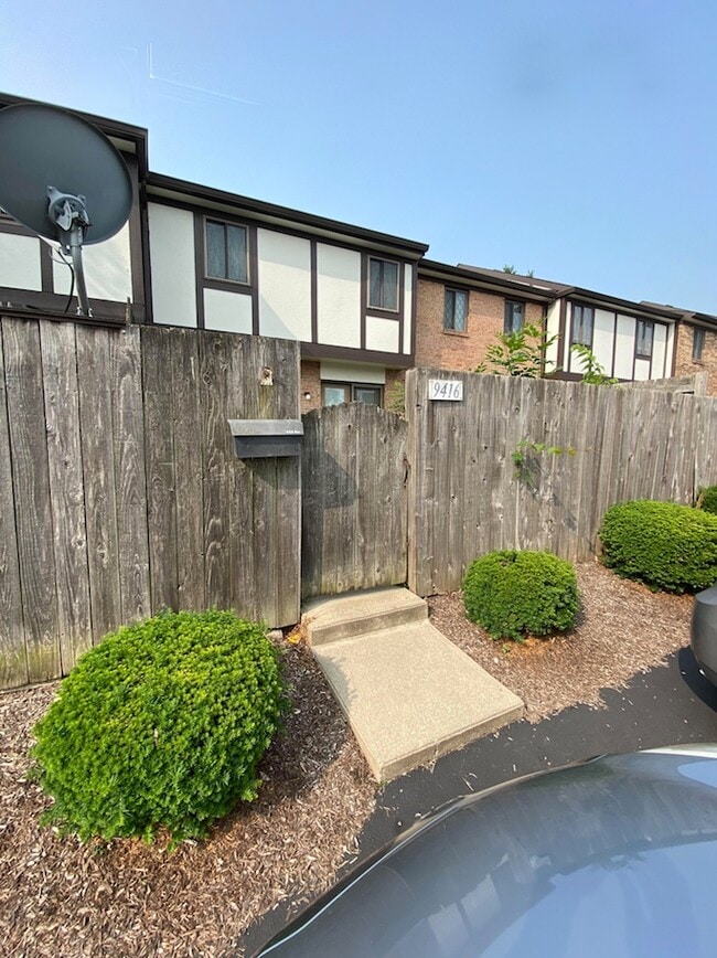 2 designated parking spots just outside the back entrance - 9416 Haddington Ct