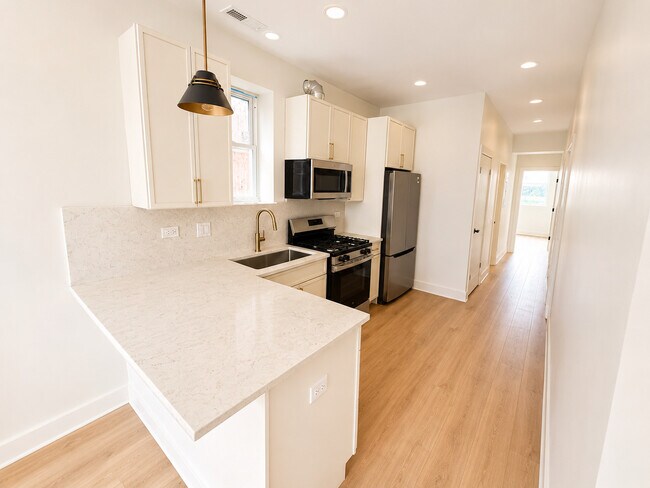Foto del edificio - 3136 N Ridgeway Ave
