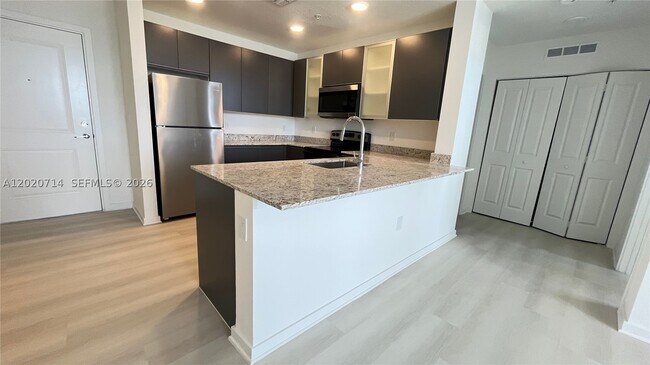 Building Photo - 5579 Millennia Park Dr