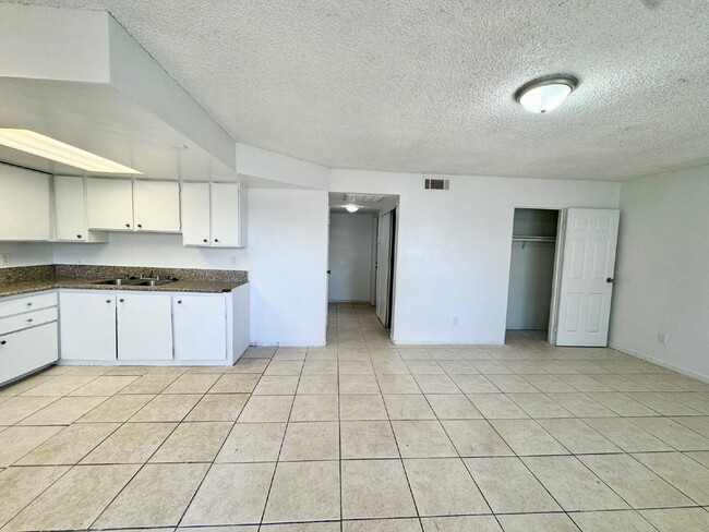 Building Photo - Bright & Budget-Friendly Condo for rent Ac...