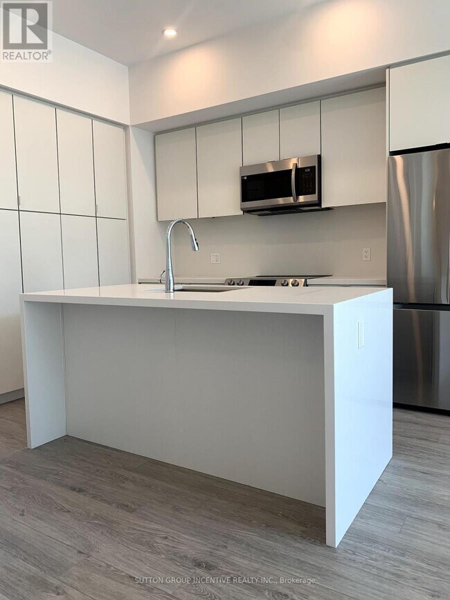 Photo du bâtiment - 415-415 Sea Ray Ave