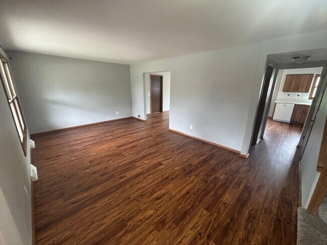 Living room and entryway - 700 E College Ave