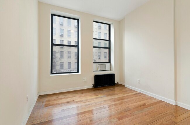 Building Photo - Hells Kitchen, Spacious Two Bed