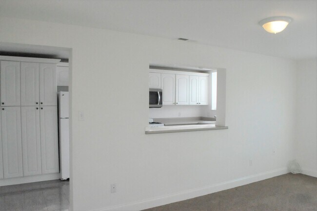 Living Room to kitchen - 3903 Moulton Dr