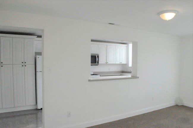 Living Room to kitchen - 3903 Moulton Dr