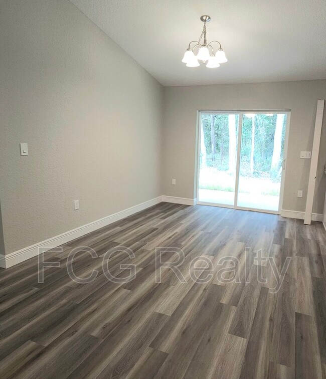 Building Photo - 10057 N Athenia Dr