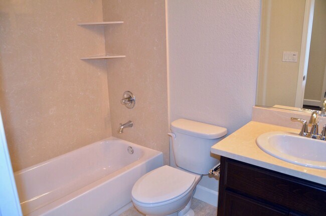 03-1F-Bed1-Bath - 1875 Hillebrant Pl