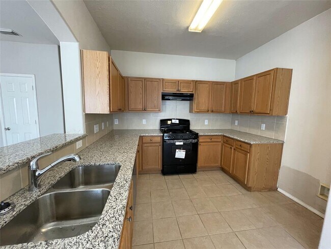 Foto del edificio - 6119 Yorktown Meadow Ln