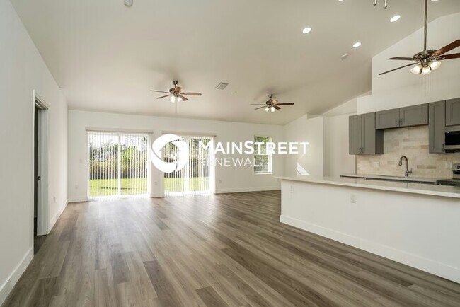 Building Photo - 4 Bedroom Pet-Friendly Home in LEHIGH ACRES, FL with Main Street Renewal