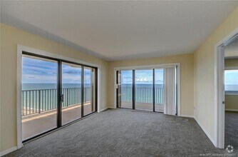 Building Photo - 10044 S Ocean Dr