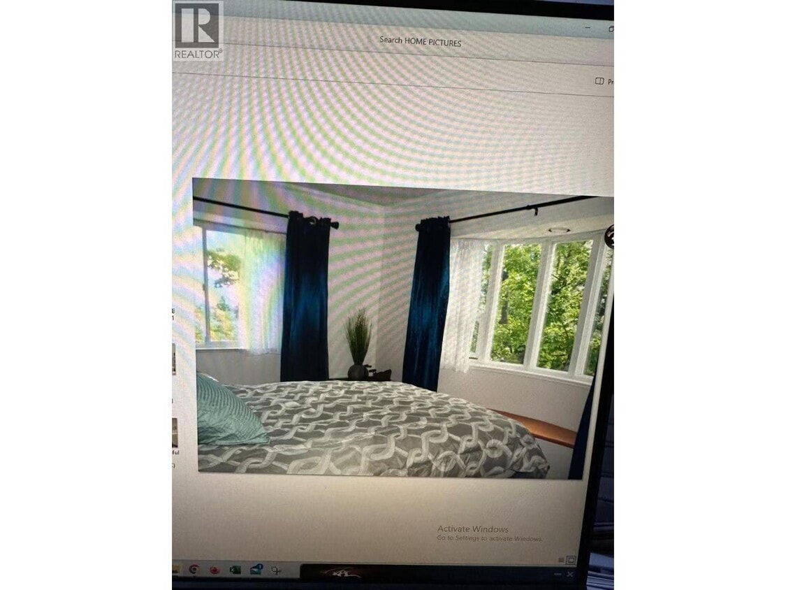 Photo du bâtiment - 8XX W 60th Ave