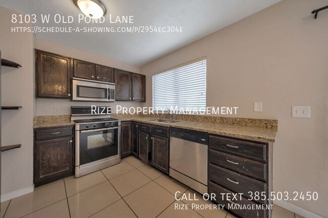 Foto del edificio - 8103 Old Pond Ln