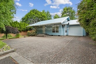 Building Photo - 4180 SW Collins Way