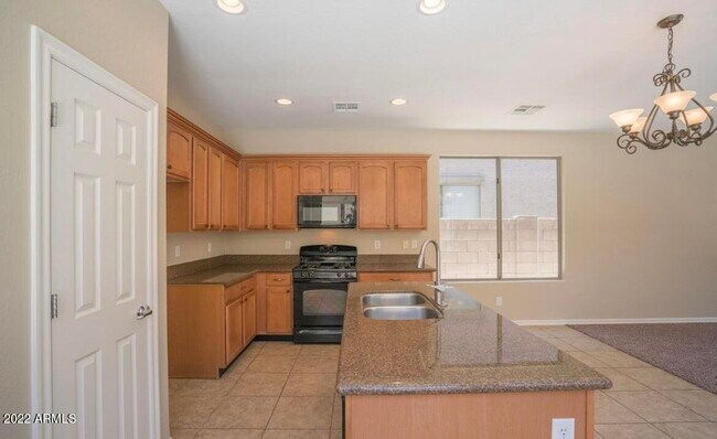 Building Photo - 14587 W Acapulco Ln