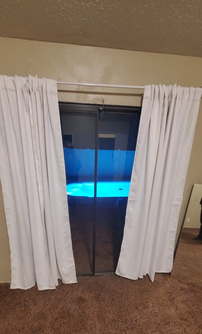 View of pool from master bedroom - 14336 Pinewood Dr