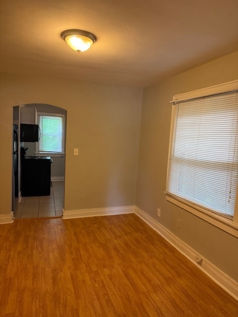 Building Photo - Adorable 2BR/1BA with spacious living area and wood floors throughout!