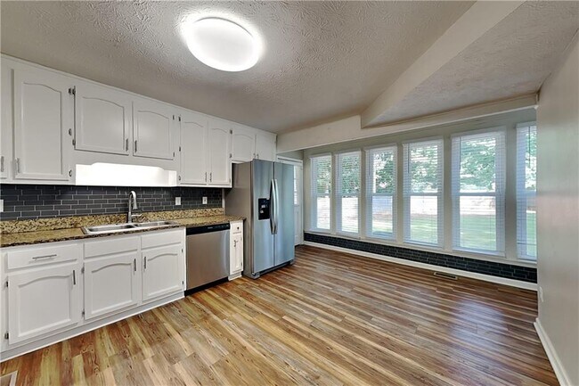 Building Photo - 6839 Woodcreek Ln