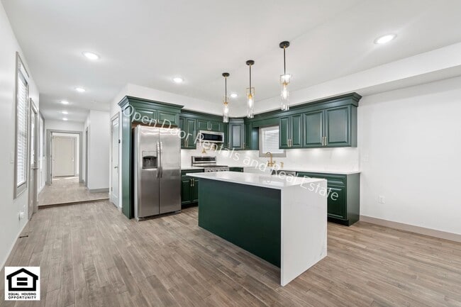 Building Photo - Welcome to our Luxury upscale single famil...