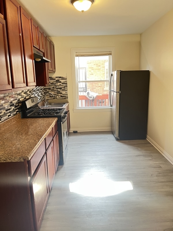 Building Photo - 653 E 90th Pl