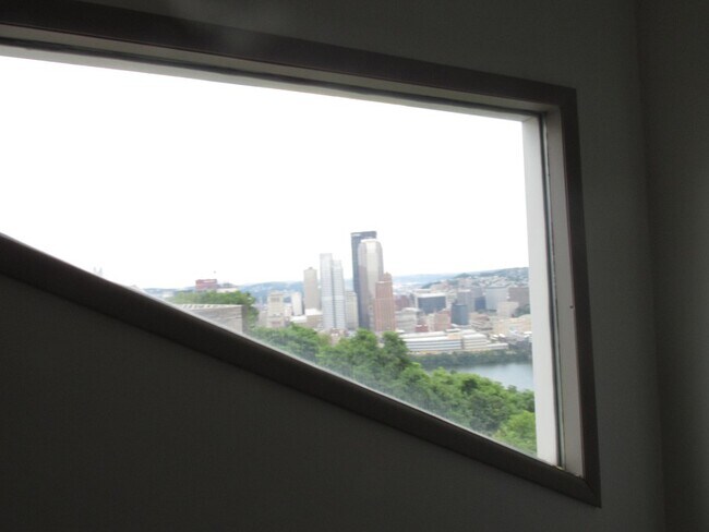 Custom Diagonal Bedroom Window - 75 Wyoming St