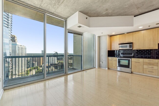 Building Photo - Sought After Realm Residences!