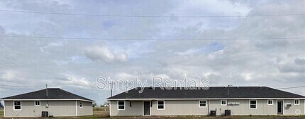 Building Photo - W. I-30