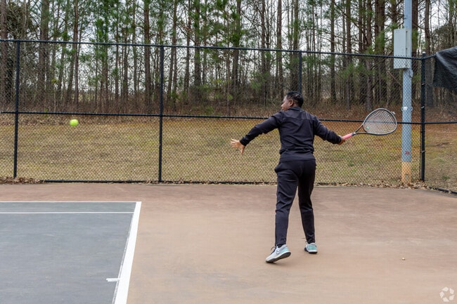 Kenwood Park offers tennis courts and basketball courts for surrounding residents.