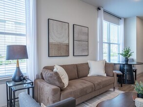 The Opal: 1BR, 1BA- Living Room - The Waters at Bluebonnet
