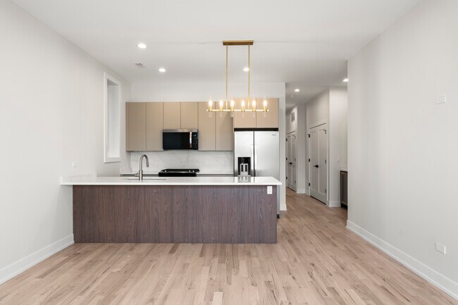 Foto del edificio - 428 E 50th Pl