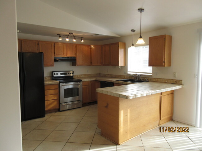 kitchen - range, fridge, dishwasher - 12609 W 10th Ave